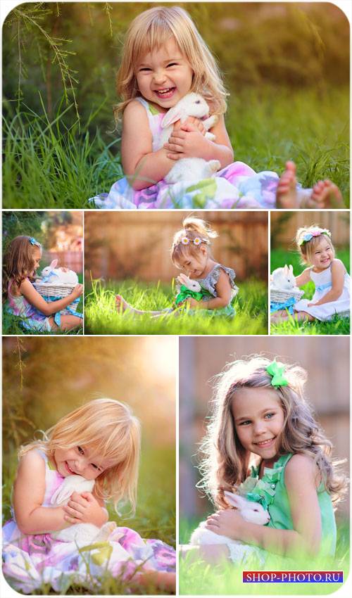 Маленькие девочки с кроликами - сток фото