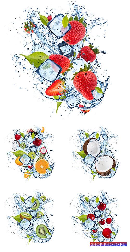 Фрукты и ягоды в брызгах воды и кусочках льда / Fruits and berries in a spray of water - Stock photo