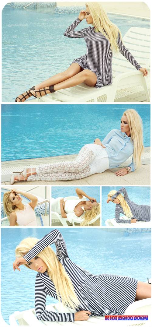 Светловолосая девушка у бассейна / Blonde girl by the pool - stock photo