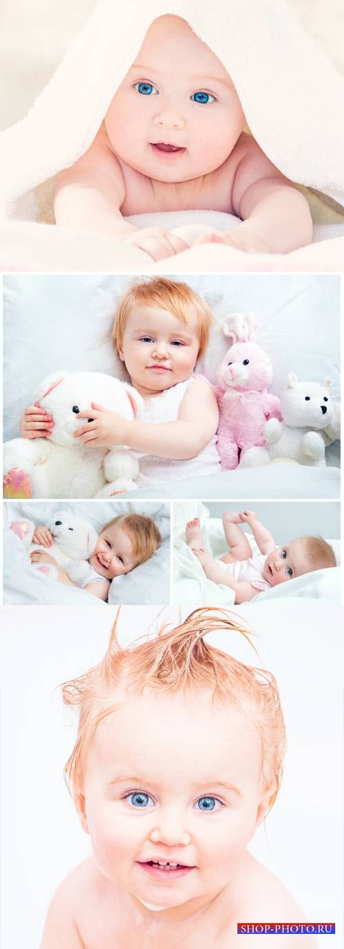 Маленький ребенок с голубыми глазами / Little baby with blue eyes - Stock Photo