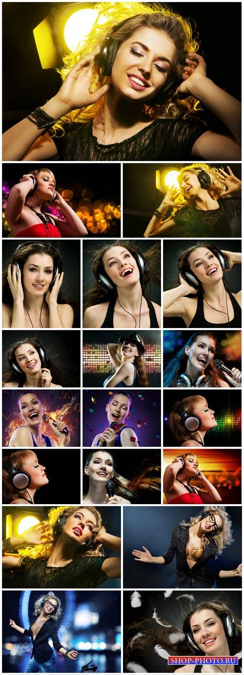 Girl in headphones listens to music - Stock Photo