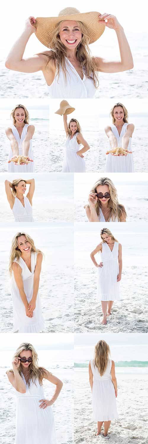 Красивая девушка в белом платье у моря - Фотоклипарт